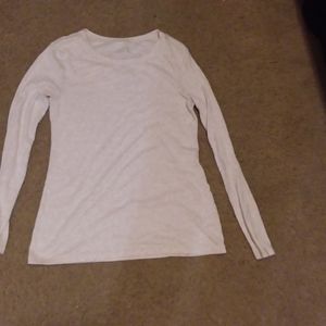 A beige shirt with long sleeves